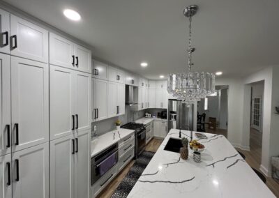 Kitchen Cabinets Raleigh White Shaker Glass Chanedlier Over Island Grey Tile Back Splash